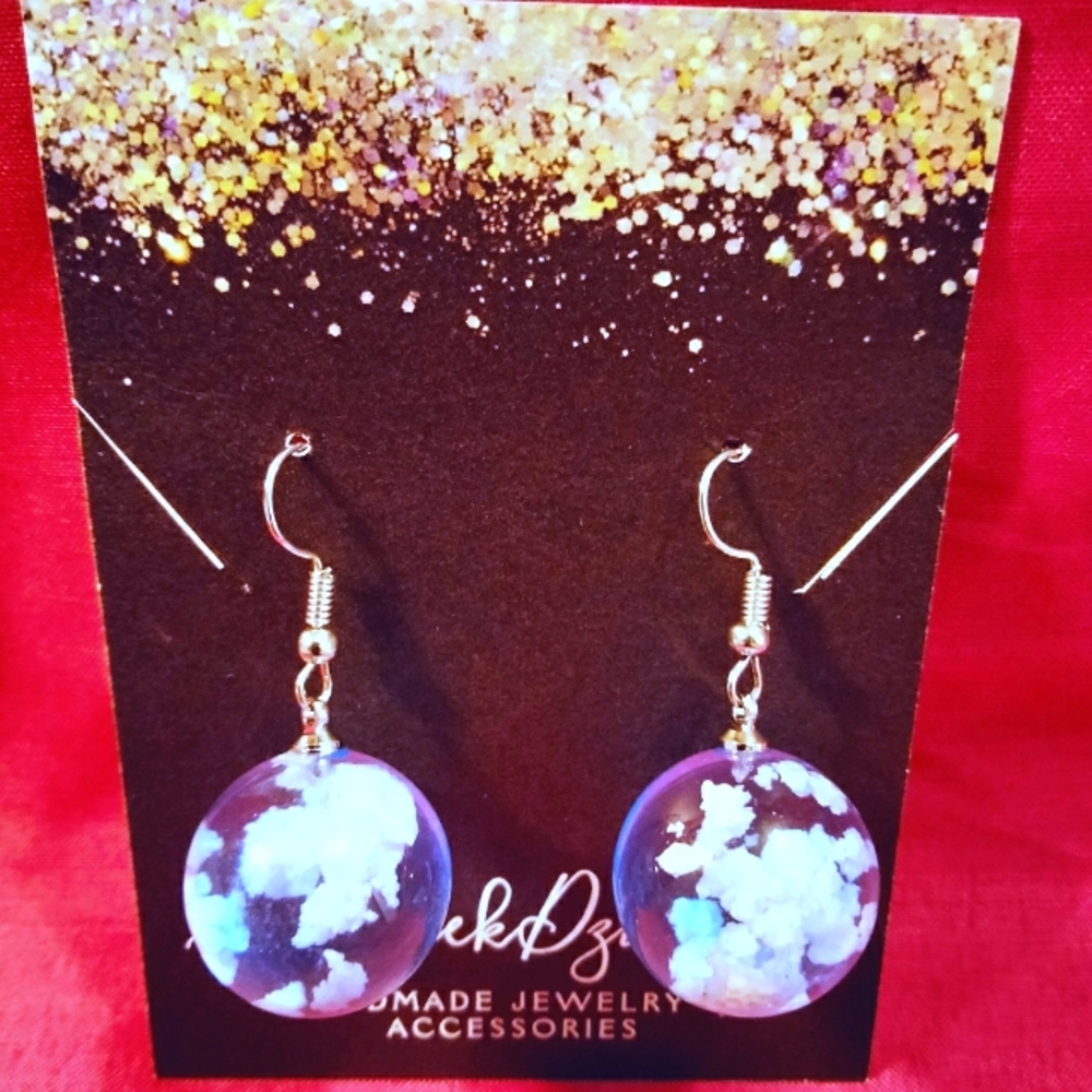 Handmade resin cloud sky drop earrings.